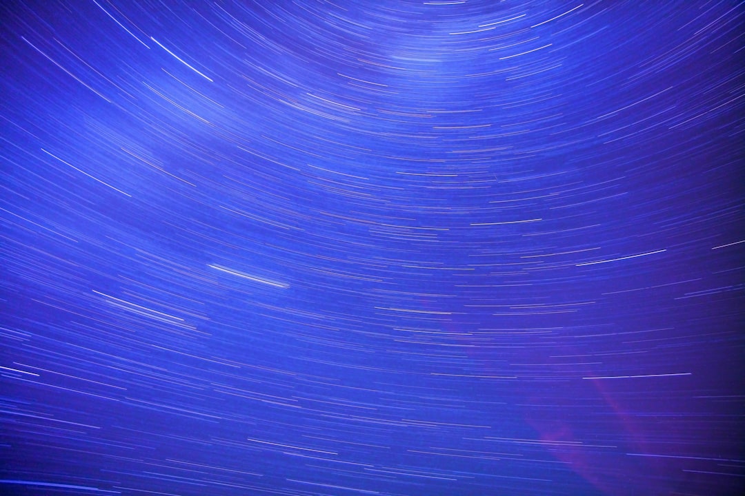 Lightricks - blue and green light digital wallpaper