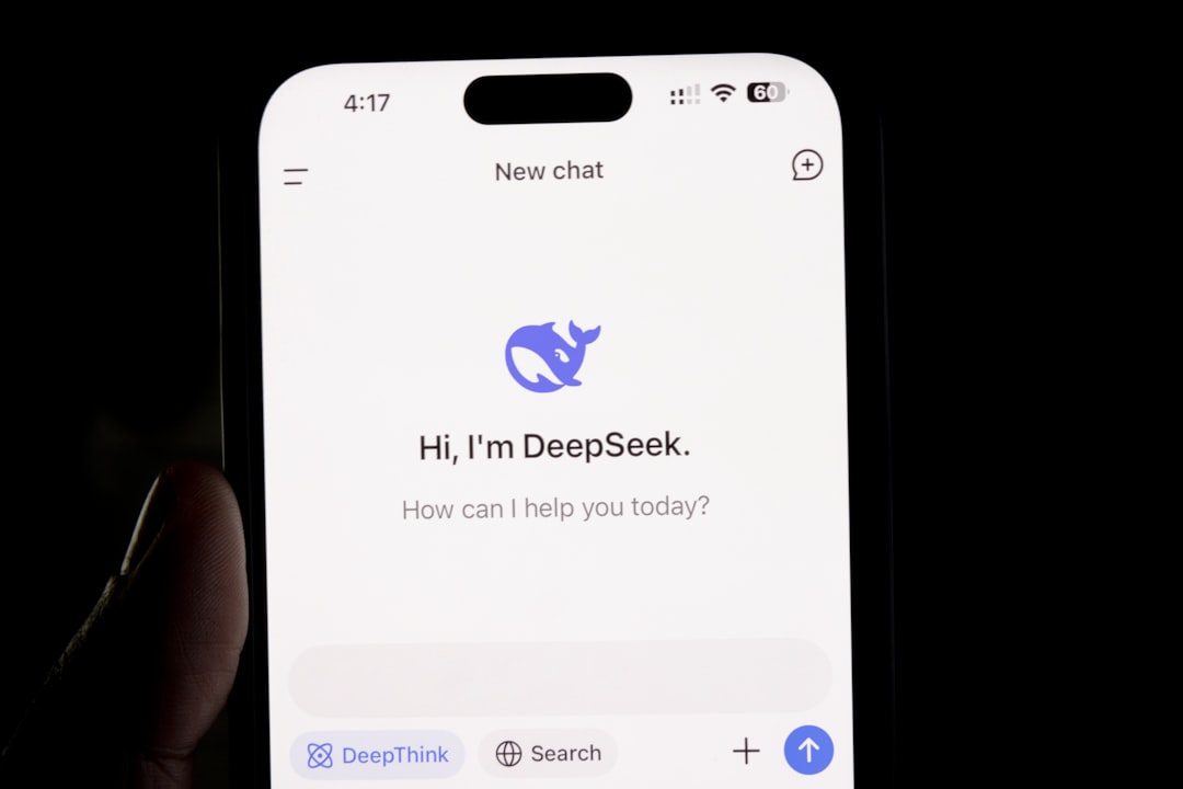 DeepSeek - A person holding a cell phone in their hand